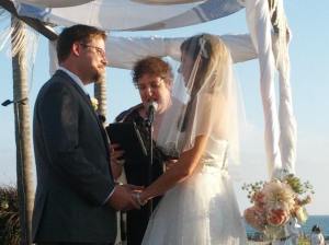 Me officiating at a wedding for a beautiful couple in a gorgeous setting.